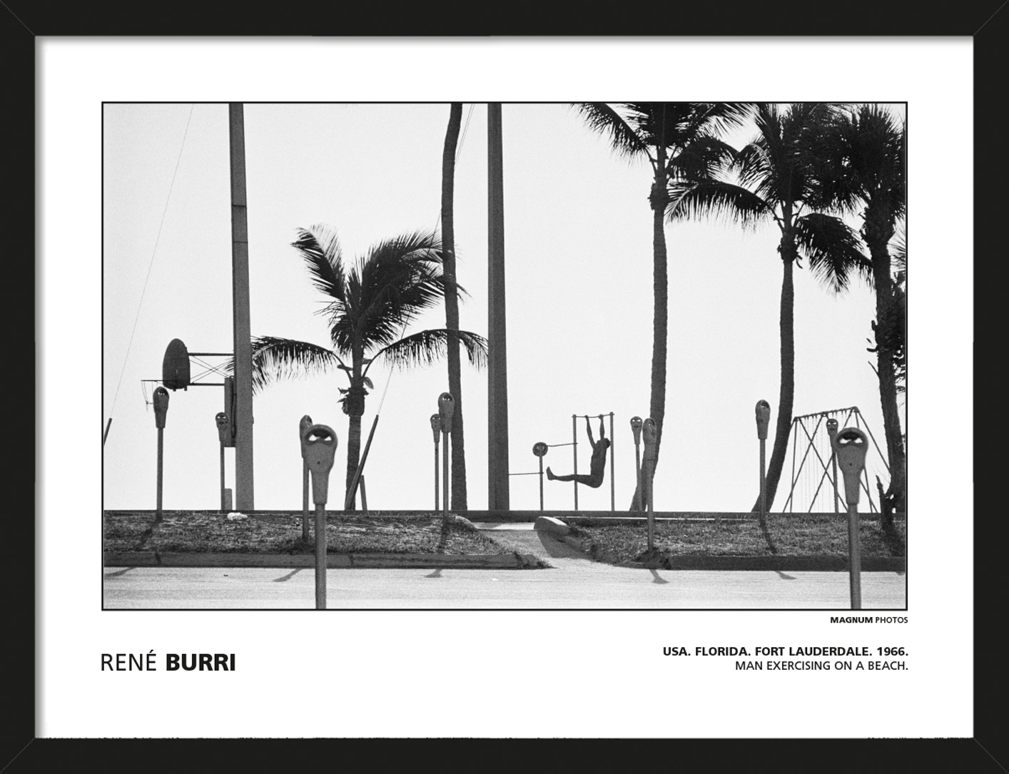 MAGNUM PHOTOS (RENÉ BURRI - USA. FLORIDA. FORT LAUDERDALE. 1966. MAN EXERCISING ON A BEACH.) Pre-Framed Art Poster
